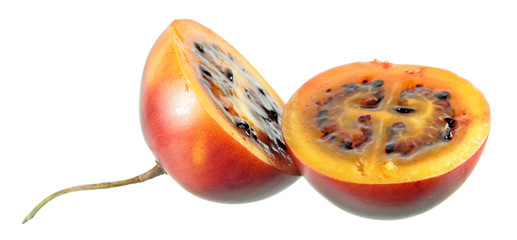 Tamarillo (tree tomato) fruit cut in half isolated on white background