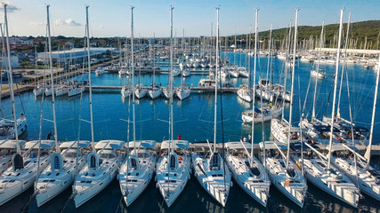 Aerial view of beautiful modern marine of Sukosan densely packed with sailing boats and yachts, Marina Dalmacija. Croatia