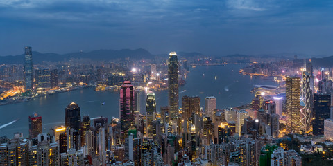 Colorful view of Hong Kong skyline on twilight time seen from Victoria Peak. Hong Kong, China.