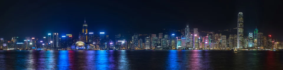 Papier Peint photo autocollant construction de la ville Vue panoramique colorée sur les toits de Hong Kong la nuit vue de Kowloon. Hong Kong, Chine.