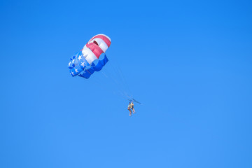 People are parachuting in the sky 1