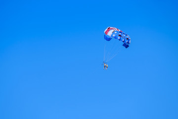 People are parachuting in the sky 3