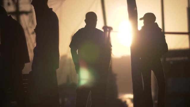 Sillhoutte cops secure crime scene, slo-mo.