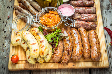 a set of different sausages, grilled on plate
