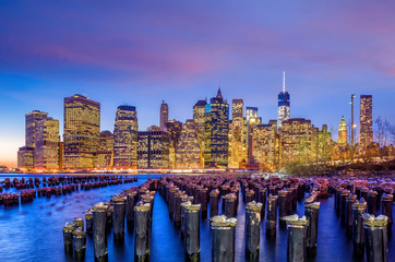 Manhattan Skyline with the One World Trade Center building at twilight