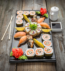 Rainbow Sushi Roll with salmon, eel, tuna, avocado, royal prawn, cream cheese Philadelphia, caviar tobica, chuka. Sushi menu. Japanese food.