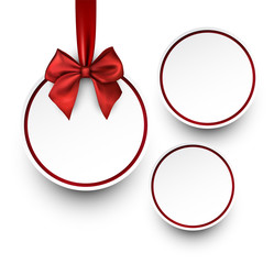 White holiday background with red bow.
