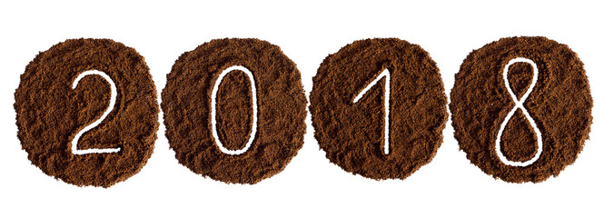 2018 decorated with ground coffee on white background