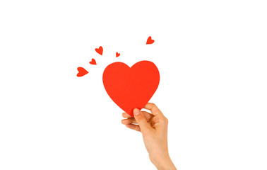 Female hand holding red Valentines card with heart on a white background.