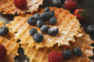 Round belgium waffles with berries