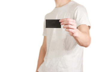 Man showing black card. Leaflet presentation. Pamphlet hold hands. Man show clear offset paper....