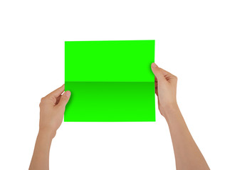 Hands holding blank green brochure booklet in the hand. Leaflet presentation. Pamphlet hand man. Show offset paper. Sheet template. Book in hands. Booklet folding design. Fold paper sheet display read
