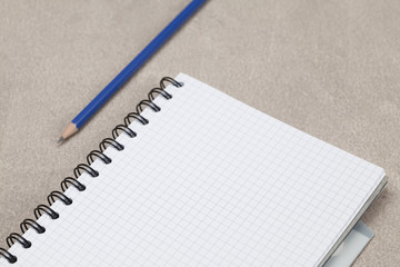 Notebook and pencil