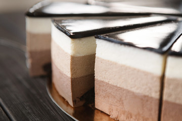 Triple chocolate layer mousse cake with glaze