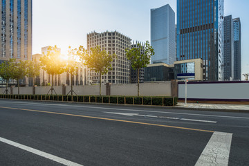 empty asphalt road front of modern buildings.