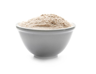 Bowl with coconut flour on white background