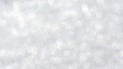 Plakat white glitter and bokeh for a background.