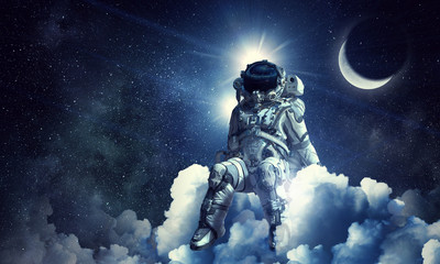Obraz na płótnie Canvas Space fantasy image with astronaut. Mixed media