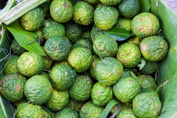 Pile of Bergamot in basket in market