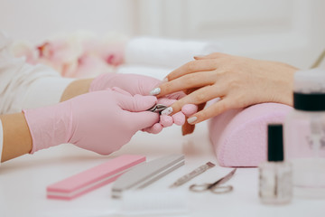 Manicurist does manicure
