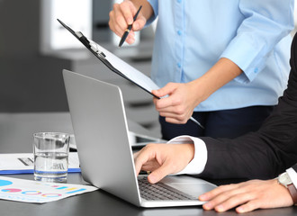 Young managers working in office © Africa Studio