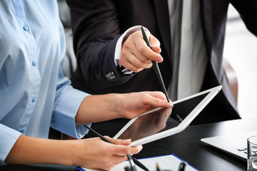 Young managers working in office © Africa Studio