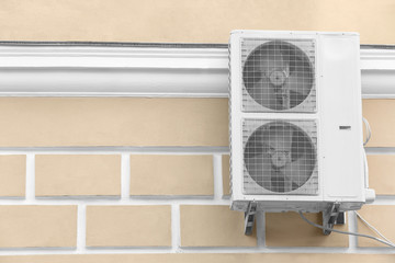 Air conditioners on wall of building outdoors