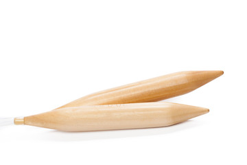 Wooden knitting needles isolated on white
