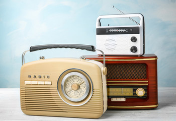 Retro radios on color background