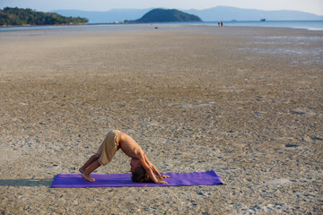 Beautiful boy on the beach
