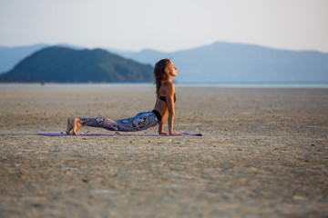 Beautiful girl practicing yoga