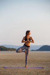 Beautiful girl practicing yoga