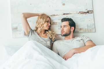 young couple in bed