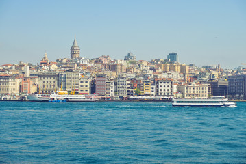 The ship carries passengers along the Bosporus Strait.
