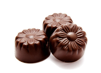 Assortment of chocolate candies sweets isolated on a white