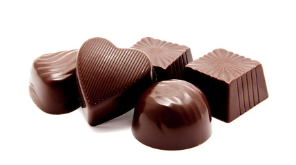 Assortment of chocolate candies sweets isolated on a white