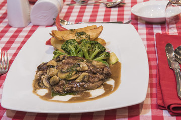 Beef fillet steak with mushroom sauce meal