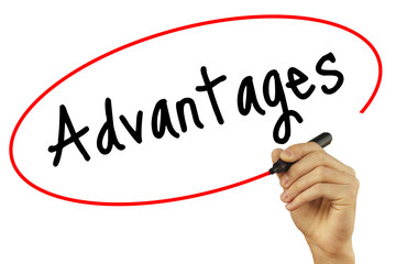 Man Hand writing Advantages with black marker on visual screen. Isolated on background. Business, technology, internet concept. Stock Photo