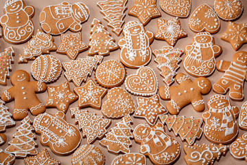 Christmas homemade gingerbread cookies on the background of Kraft paper. Top view.