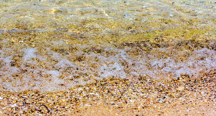 Sea waves hit the shore. At the beach in thailand
