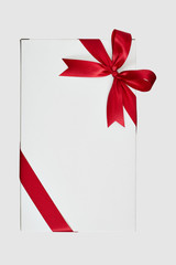 Red ribbon bow on white background.