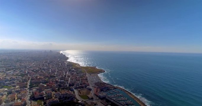 Aerial shot high above Tel Aviv and the Mediterranean