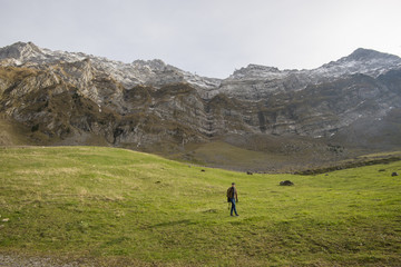 Fototapeta na wymiar Tourist man and Beautiful view of valley mountain Saentis , Switzerland