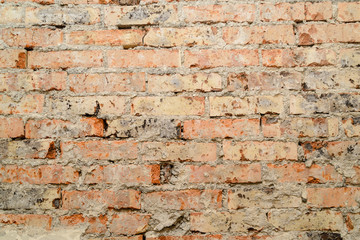 Scuffed brick wall