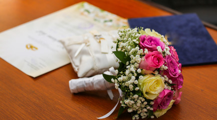 Wedding day, flower bouquet, and silk pillows for weddings