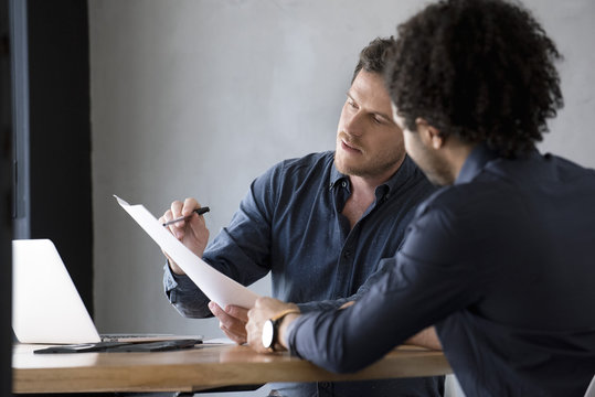 Man listening while document explained