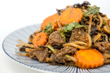 fried beef noodle food on the table