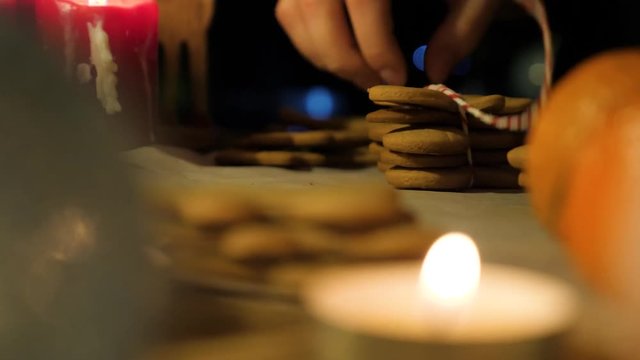 Women is bandage with a rope cookies for gift sets. Christmas cookies. Traditional christmas dessert