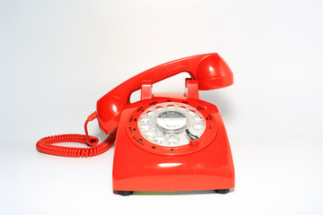 Retro rotary dial phone on call with no body, hang up by hollow man