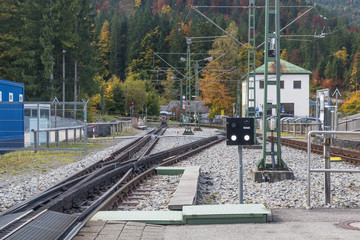 Fototapeta premium Waiting for the cogwheel train to the Zugspitze in the station of Eibsee